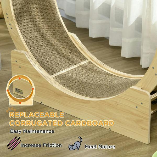 Curved grey scratching surface inside oak-toned cat exercise wheel base