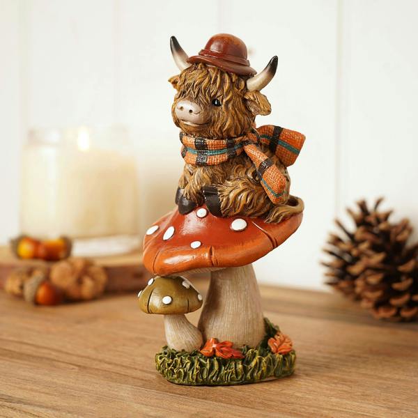 Country Living Highland Cow on Mushroom