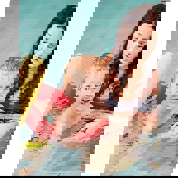 Yellow comfy noodle connector with red and green accents, foam swim noodle