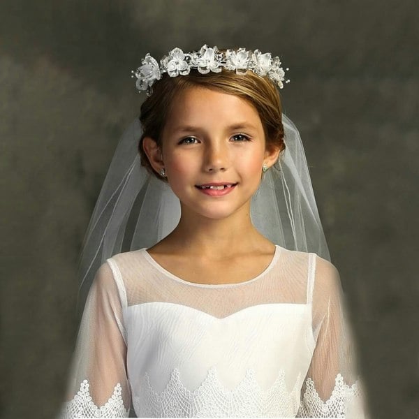 Girl in a white dress and Rhinestone Crown with Veil