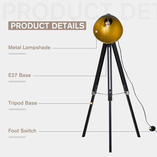 Tripod floor lamp close-up with black metal legs and gold lamp head