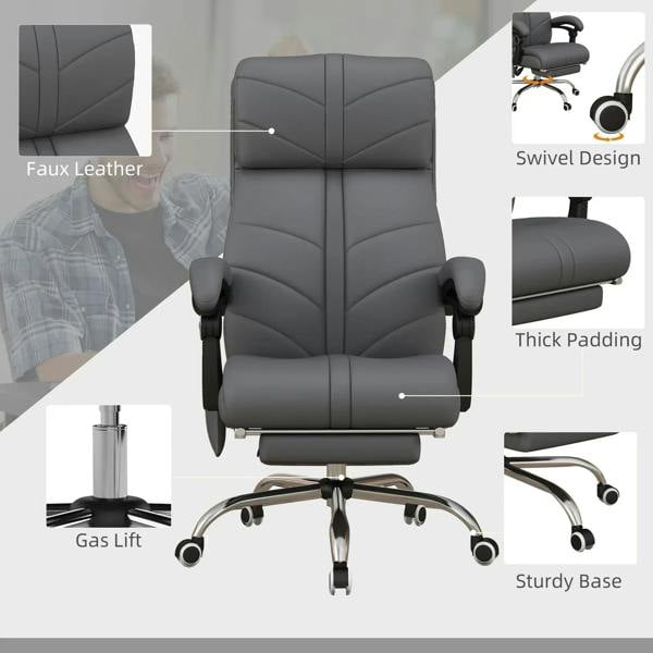 Grey faux leather office chair with thick padded back and seat, rolling swivel base