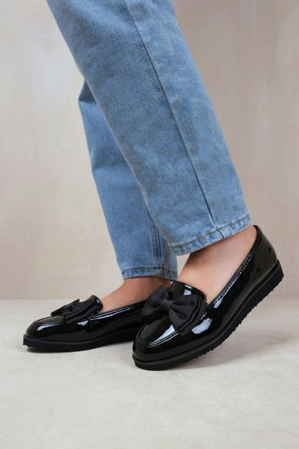 Where's That From ALPHA SLIP ON LOAFER SLIDER WITH BOW DETAIL IN BLACK PATENT FAUX LEATHER