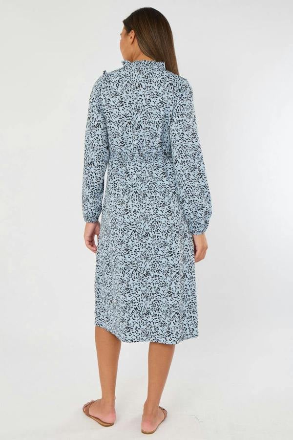 Woman wearing a floral dress on a white background