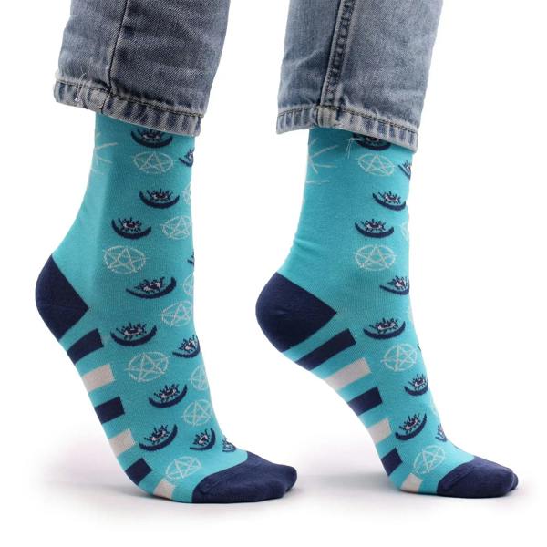 Turquoise bamboo socks with navy pentagram and evil eye prints and striped heels.