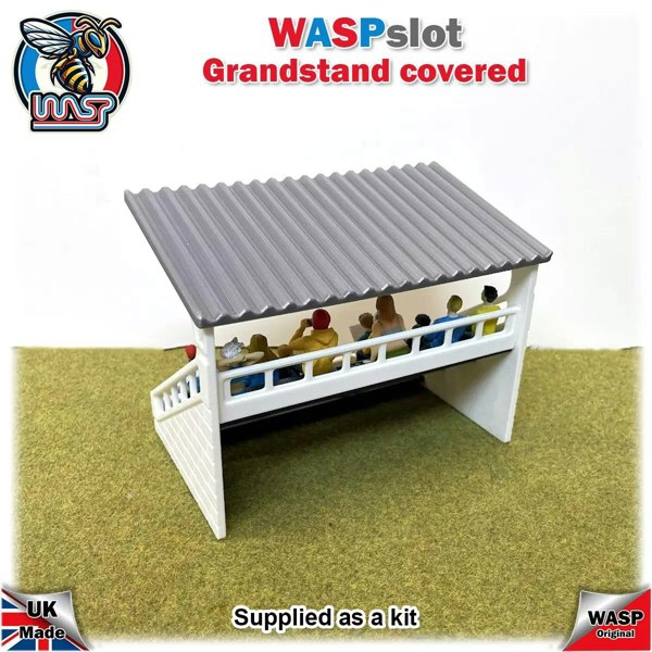 a toy bridge with people sitting on it