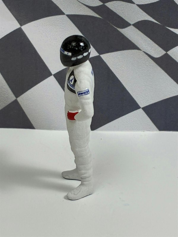 a toy figure wearing a helmet