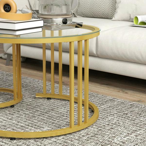 Gold round nesting coffee table set showing steel frame and clear tempered glass top