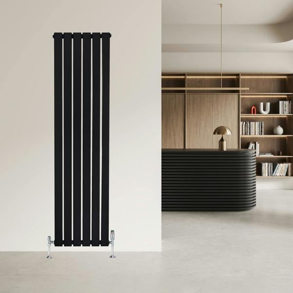 Sleek black flat single column radiator, 1600 x 420mm, mounted on a light wall, complementing modern interior design elements