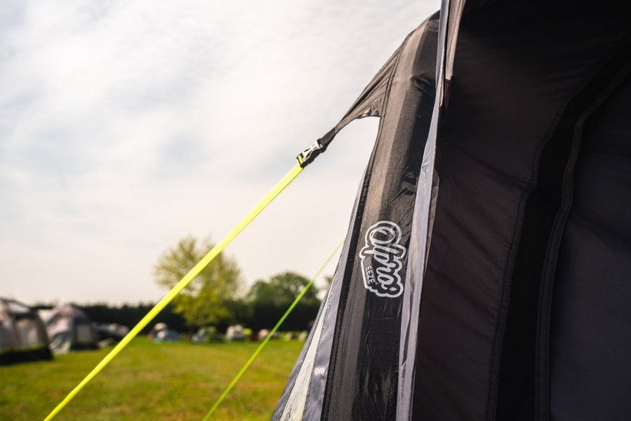 storm strap & breeze logo on a Loopo Breeze® v2 Inflatable Campervan Awning by OLPRO imageset:Charcoal