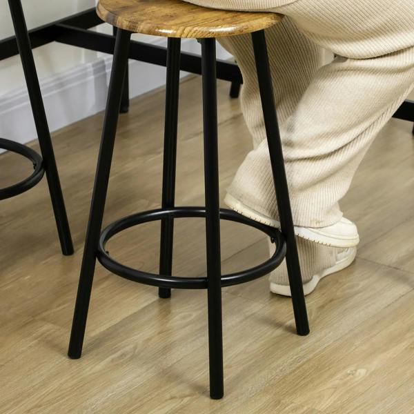 Round black stool with rustic brown seat and ringed footrest