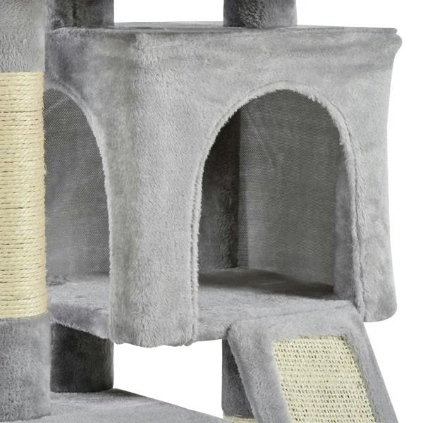 Grey plush cat tree condo with arched entrance and nearby sisal scratching ramp