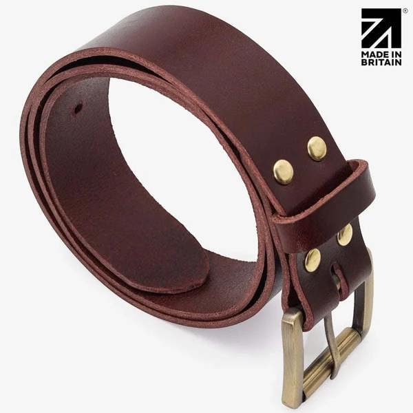Coiled brown leather belt showing the gloss finish and brass roller buckle