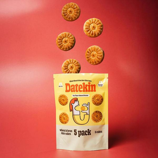 Datekin 5-pack wheat and bran cake package with cakes flying out on a red background