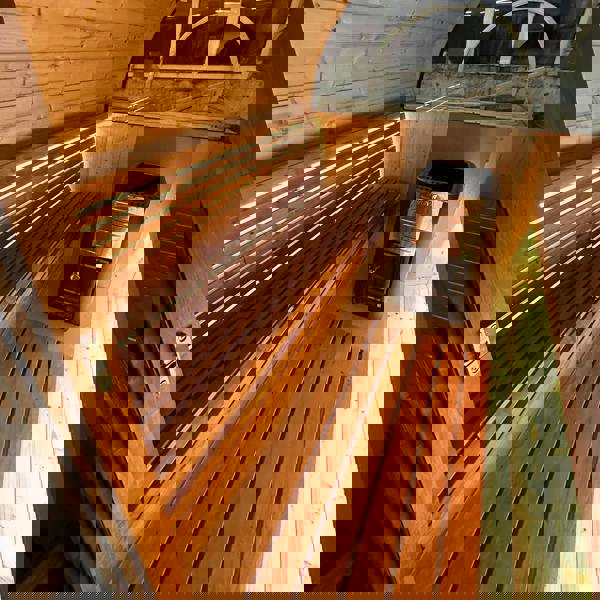 Ergo bench in a wooden sauna with heater