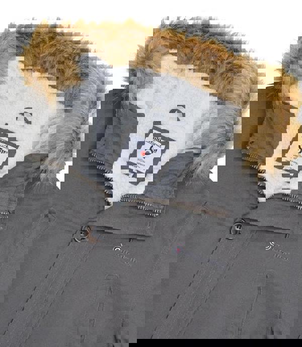 Lambretta Men's/Women's Carnaby Scooter Hooded Classic Mod Ska Badge Parka, close-up of the grey jacket with a furry hood lining and Lambretta logo.