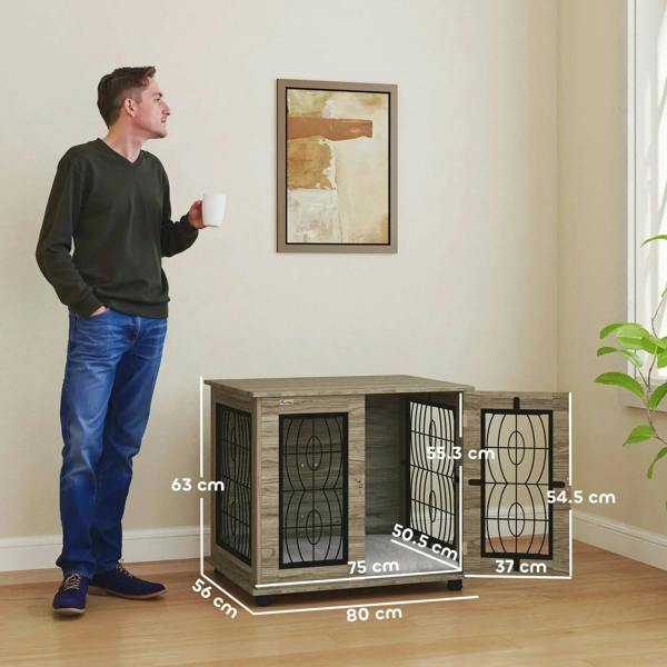 Gray dog crate end table with front metal doors, lock, and soft cushioned interior.