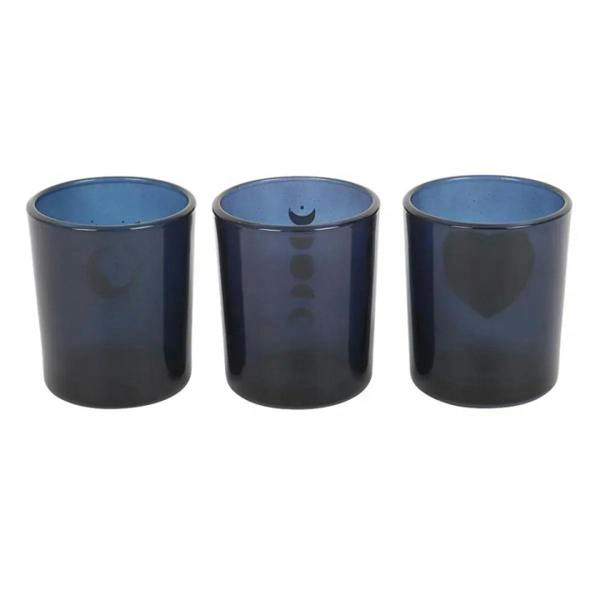 Set of 3 blue votive candle holders with subtle moon-phase design details