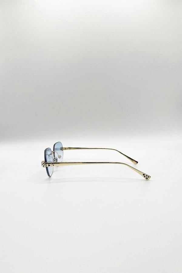 Jaguar Detail Rimless Sunglasses In Blue - svnx