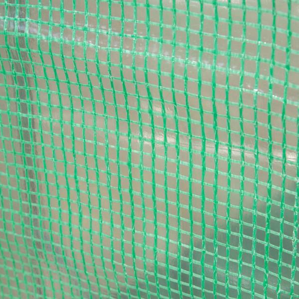Close-up of green PE greenhouse cover mesh fabric