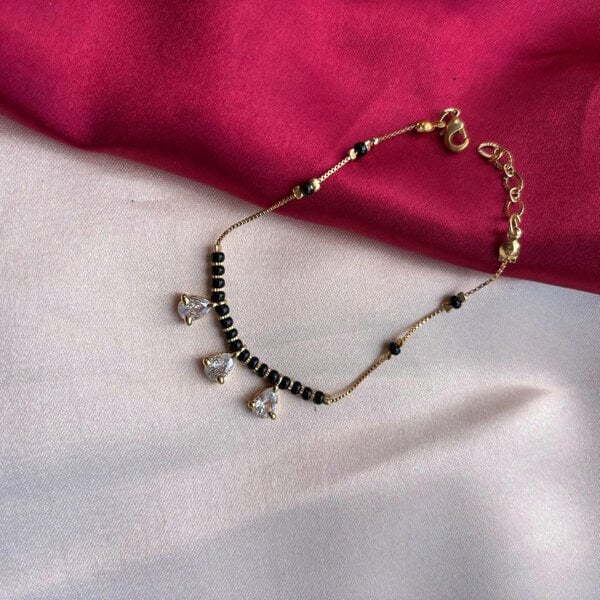 The Colourful Aura Black Bead Mangalsutra Zircon drop gold nazar Bracelet