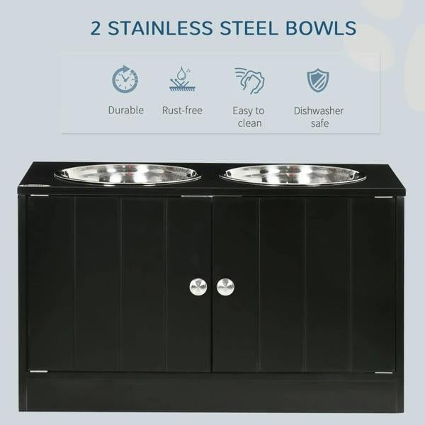 Black pet feeding station with two stainless steel bowls and a front storage cabinet.