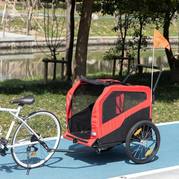 Red and black pet bicycle cart with side door mesh window and hitch connection