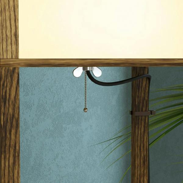 Brown lamp top detail with cord and hanging pull-chain over the upper glass shade