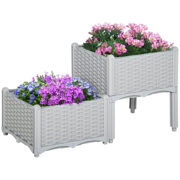 Set of two grey rattan-effect planters with woven sides and four supporting legs