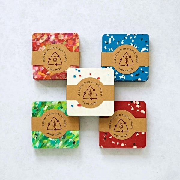 Set of 4 Recycled Plastic Square Coasters, made from recycled plastic with a label on them.