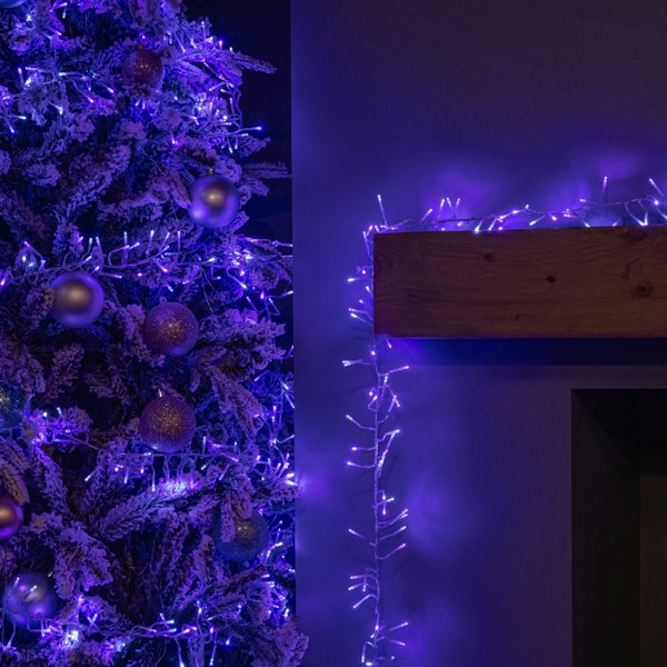 Samuel Alexander 9.3m 720 LED Christmas Cluster String Lights with Timer in Blue, Purple & White on Clear Cable