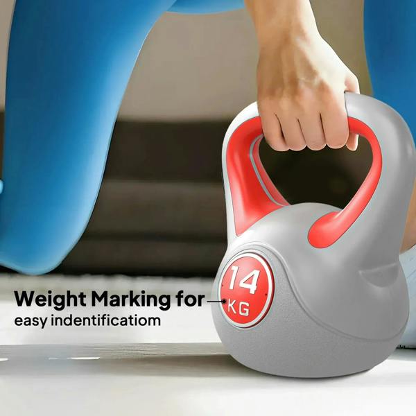 Grey and red kettlebell with 14 KG marking and red handle, held by the handle.