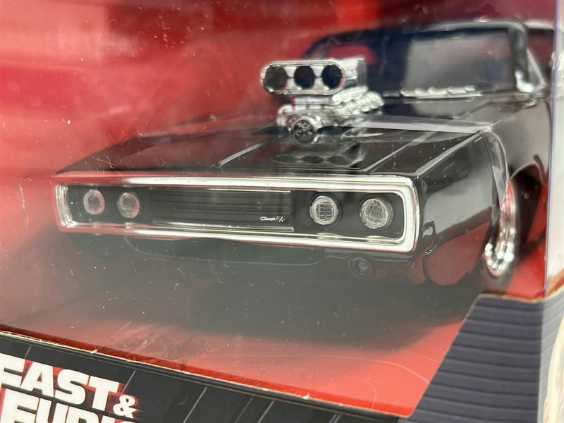 a toy car in a box