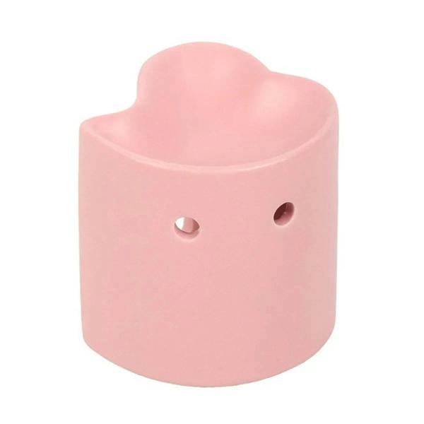 Pink heart-shaped oil burner with two air holes on the front face