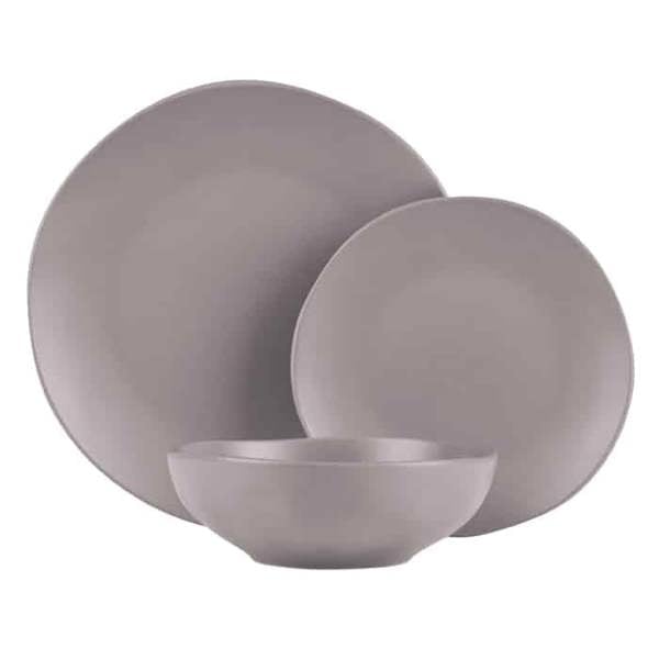 A grey stoneware dinnerware set consisting of a large dinner plate, a smaller salad plate, and a bowl, all with a slightly organic, uneven shape.
