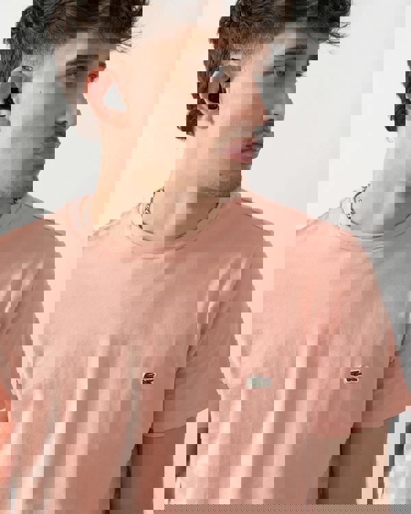 close up shot of model wearing a Lacoste Mens Crew Neck Pima Cotton Jersey T-Shirt in Miami UI2