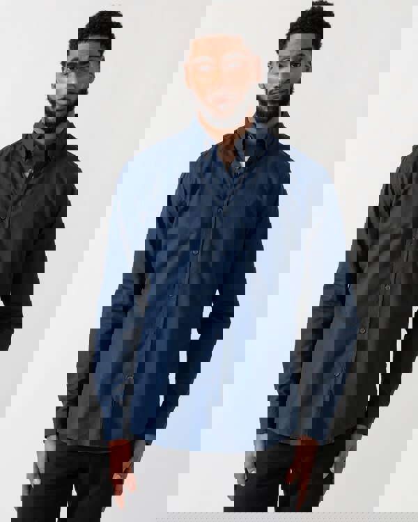 model wearing a BOSS Orange Rickert_M Mens Shirt in Open Blue