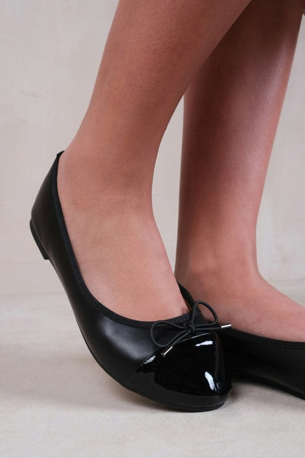 Where's That From Janice Ballerina Flats With Front Bow Detail in Black Faux Leather