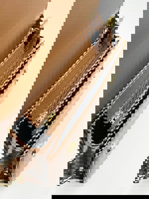 SVNX Rounded Cross Body Bag in Brown