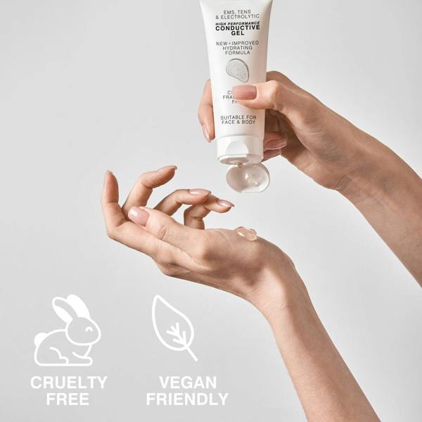 A person dispenses Rio's EMS, TENS, Electrolytic and Micro-Current Toning Conductive Gel (4 x 85ml) from a white tube. Icons below show it's cruelty-free (rabbit) and vegan-friendly (leaf), ideal for micro-current or EMS toning routines.