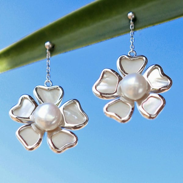 Sterling silver floral earrings featuring freshwater pearl and mother-of-pearl petals.