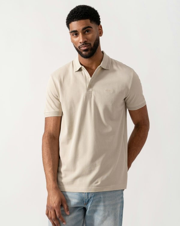 Model wearing BOSS Green Mens Paddy Cotton-Piqué Polo Shirt with Contrast Logo in Light Beige 275 - Main
