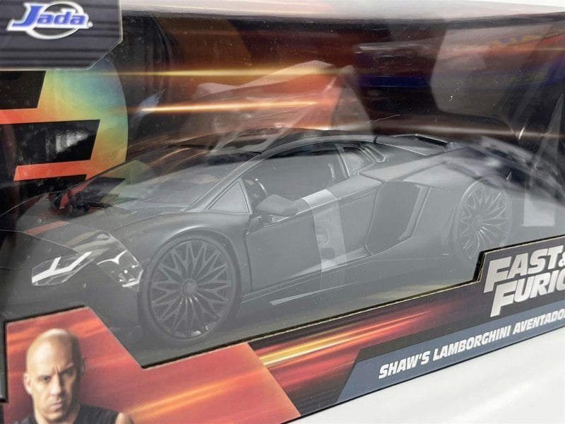 a toy car in a box