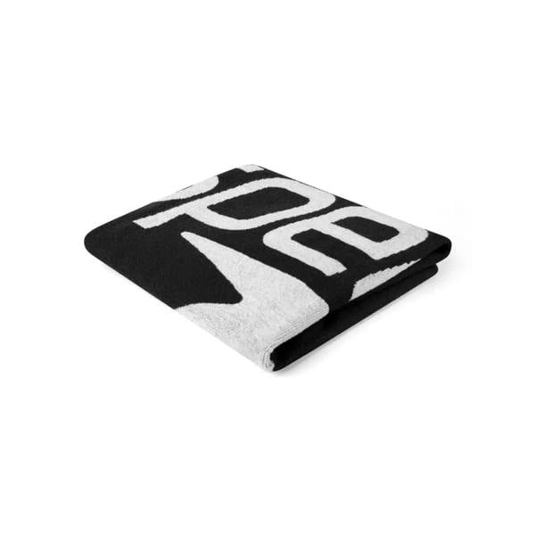 Black and white Speedo logo towel with bold roar design and excellent absorption