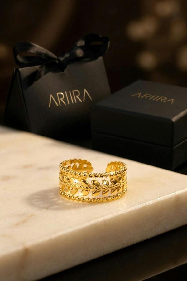 ARIIRA Meadow Gold Tone Open Leaf Band