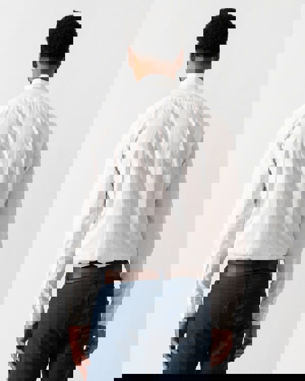 back shot of a Model wearing HUGO Ermo Mens Slim-Fit Shirt in Stretch-Cotton Canvas in Open White