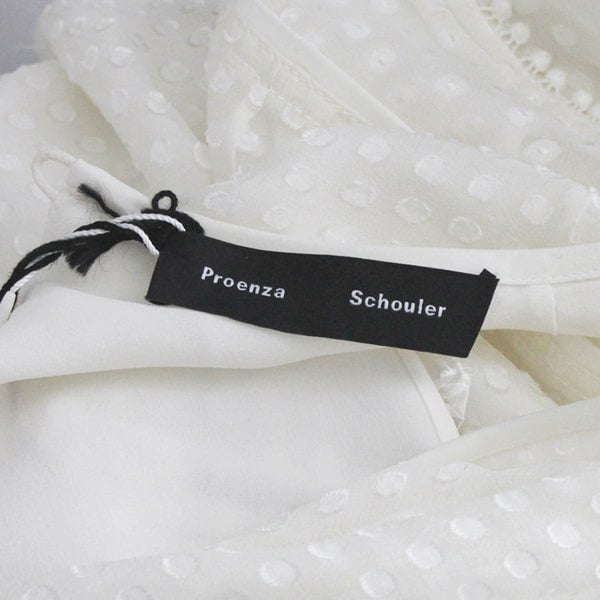 Proenza Schouler ivory tunic top in an embossed polka dot pattern