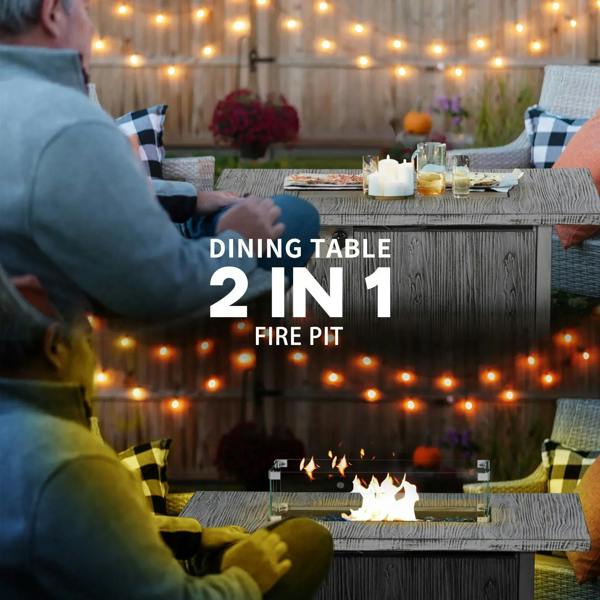 Grey gas fire pit table with glass screen and visible burner flames