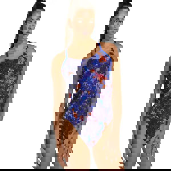 Purple and orange TYR Montipora Durafast Elite Cutoutfit swimsuit with blue galaxy print