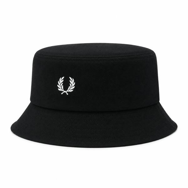 Fred Perry black piqué bucket hat with embroidered white laurel wreath logo.